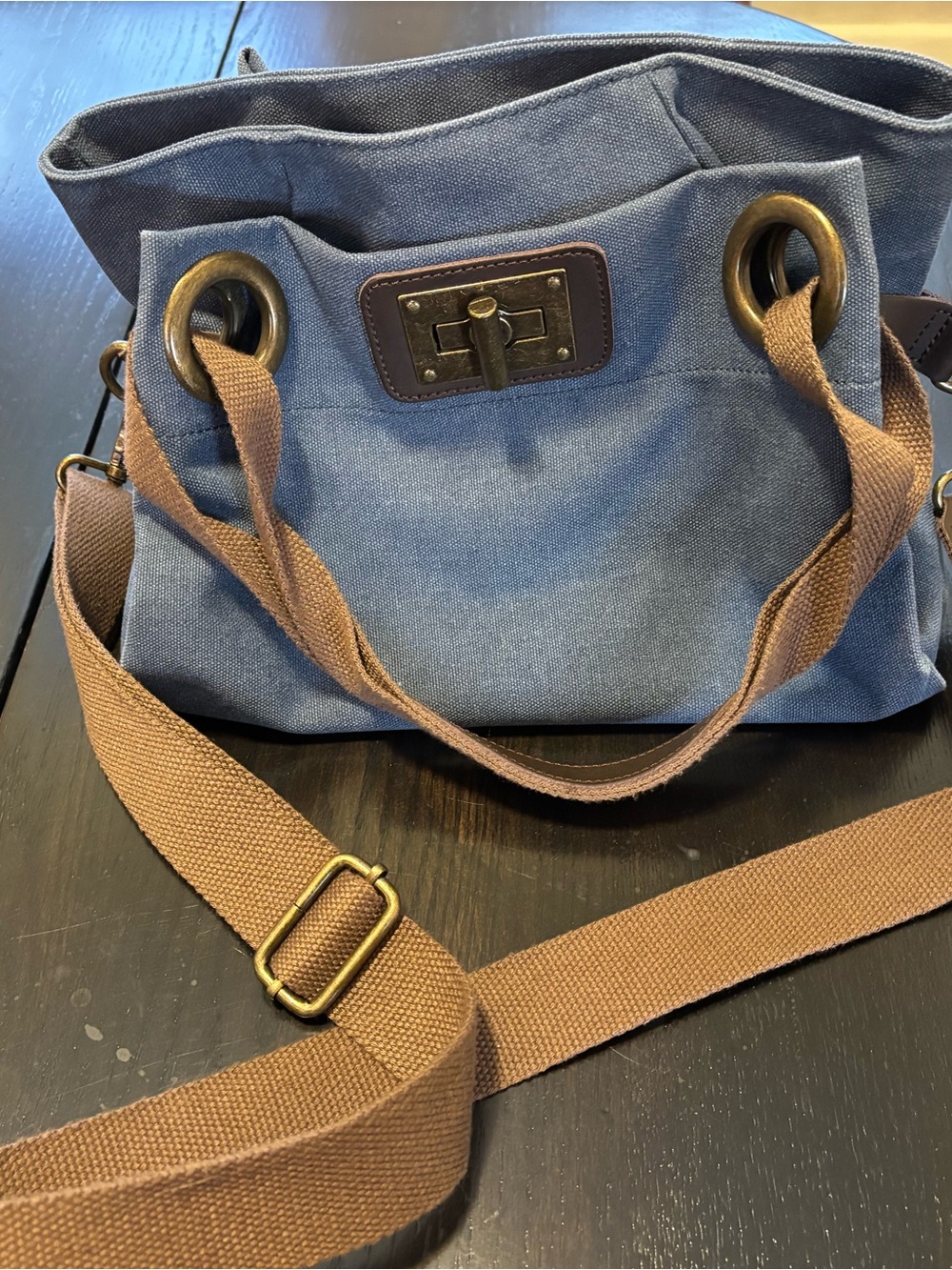 Blue Canvas Crossbody Bag with Brown Strap and Turn-Lock Detail